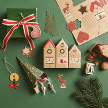 Laden Sie das Bild in den Galerie-Viewer, PAPER POETRY – Adventskalender-Bastelset aus Papier – Weihnachtsmarkt