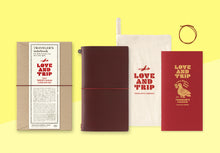 Laden Sie das Bild in den Galerie-Viewer, TRAVELER‘S COMPANY – LOVE AND TRIP - Traveler‘s Notebook Regular rot