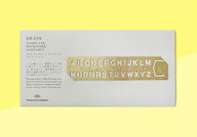 Laden Sie das Bild in den Galerie-Viewer, TRAVELER'S COMPANY – Alphabet Schablone und Lesezeichen - Messing